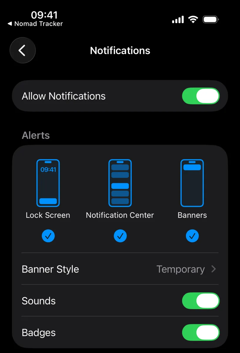 The iOS notification settings for Nomad Tracker with Allow Notifications on, and Lock Screen, Notification Center and Banner all selected
