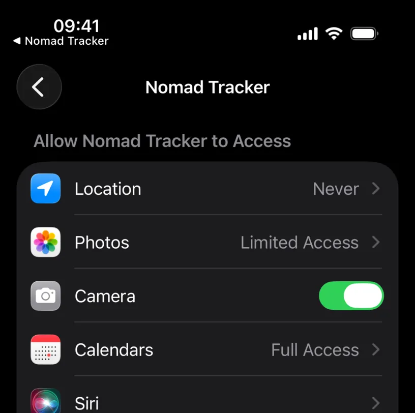 The Nomad Tracker page in iOS Settings, listing Location, Photos on Limited Access, Camera and Calendars